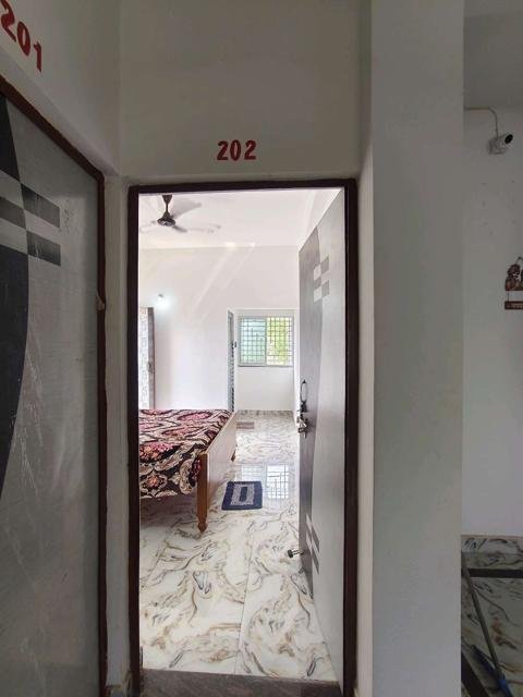 Deluxe Double Room with Balcony (Room 202) at GB Guest House, Ghatsila