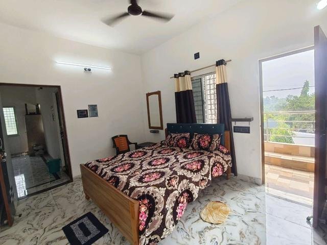 Deluxe Double Room with Balcony (Room 202) at GB Guest House, Ghatsila